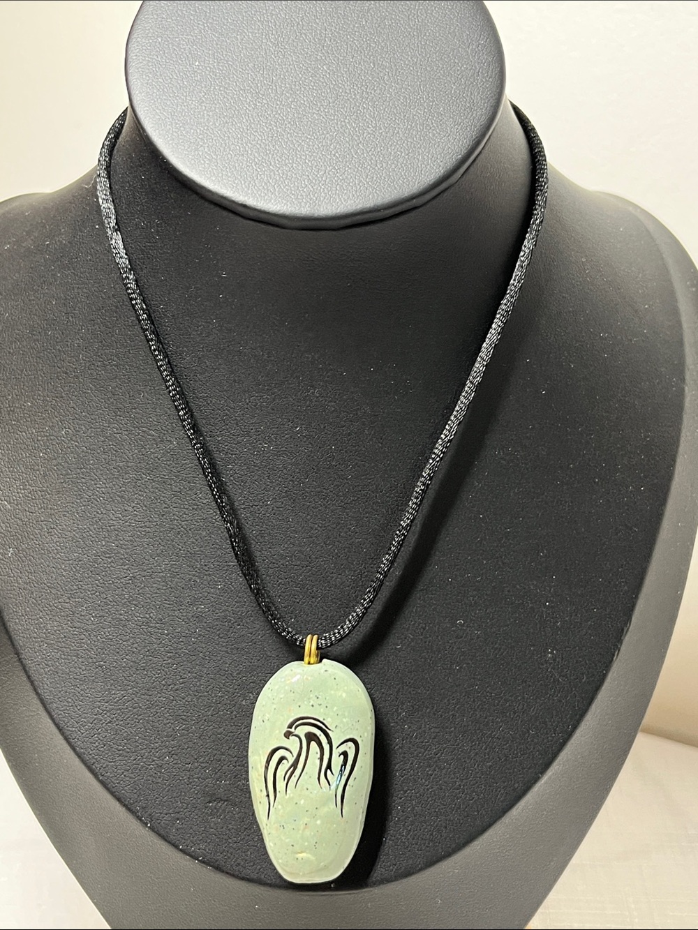 Unique stone necklace 
Claw mark on back
New
Satin cord. 
Tie knot to length.